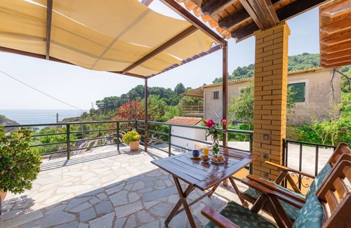 Sinarades Apartment | Rainbow apartment A,Pelekas beach,40 meters from the sea