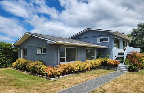 Rainbow Point House | Rainbow Point Pad - Large elevated bach with lake and mountain views, Free WiFi