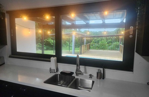 Mameyes II House | Rainforest Serenity Home- Charming 3-bedroom home in Río Grande, WiFi, AC & Pool