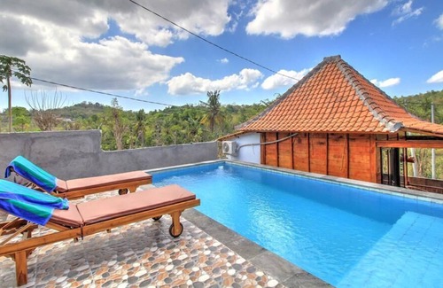 Klumpu House | Raja Bungalow by Wizzela