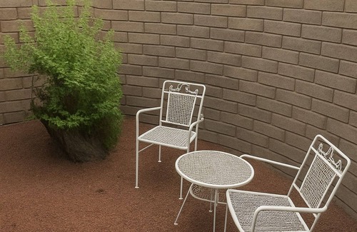Northeast Heights Apartment | Rare Bart Prince 2BR Townhouse in Santa Fe Charm - MONTHLY STAYS AVAILABLE!