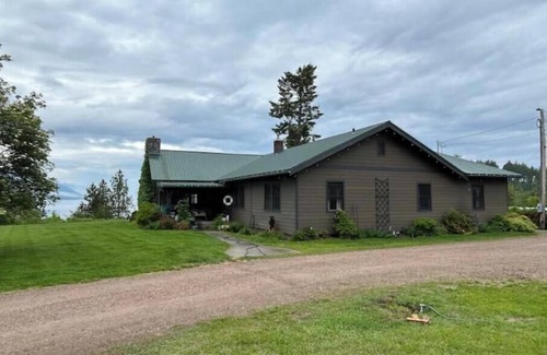 Woods Bay House | RARE FIND: Over 200' of Flathead Lake Lakefront with distinctive home