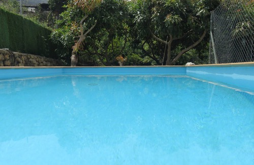 Las Cuevas House | real Canarian finca with great sea and Teide views, pool, barbecue, parking