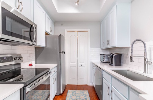 Shepherd Mountain Condo | Recently Remodeled Top Floor Condo W/Great Hill Country Views & Private Garage!