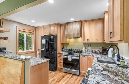 Mount Hood Village Cabin | Recently remodeled riverfront home with fireplace, firepit & W/D - dog-friendly