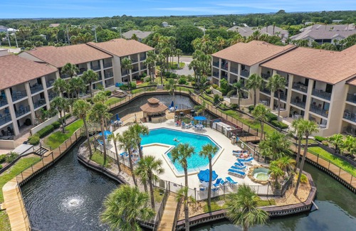Surfcrest Village Condo | Recently updated resort condo with 2 pools, 2 balconies, ocean views, BBQ, & W/D