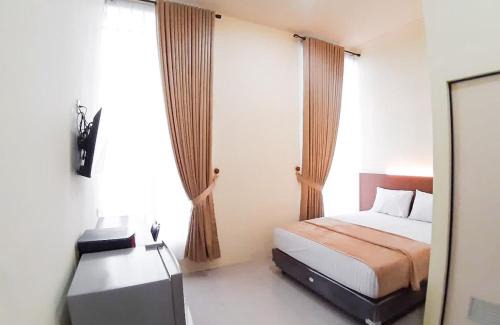 Jambi Hotel | RedDoorz Syariah near Transmart Jambi 2