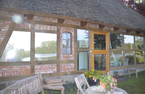 Grebin House | Reetdachkate on stud Schierensee - Fischerkate