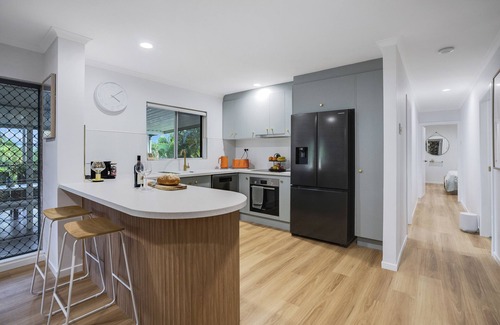 Mooroobool House | Refreshed Family Home with Large Deck and Tropical Mountain View