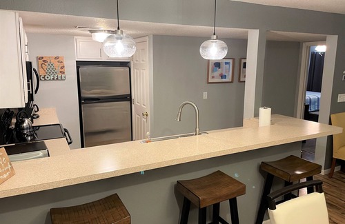 Village of Four Seasons Condo | Regatta Bay 488-1B - Modern Great Corner Unit Condo in Regatta Bay Complex.