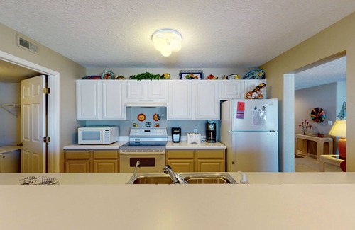 Village of Four Seasons Condo | Regatta Bay 404B- Walk-in level condo