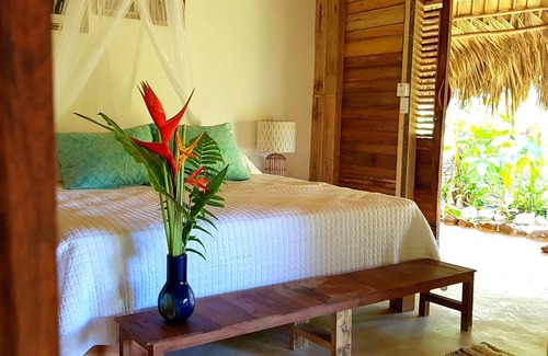 Samana Cabin | Regenerative tropical lodge with chic details , steps away from the beach.
