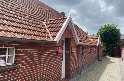 Strackholt Apartment | Reihenhaus in Strackholt mit beheiztem Pool