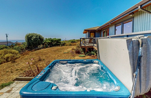 Manchester House | Rejuvenate in this home with fire place, hot tub, ocean/lighthouse/sunset views