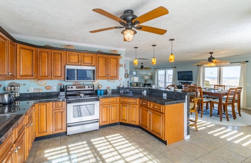 Corolla House | Relax among the dunes and see wild horses from the porch at Shifting Sands!