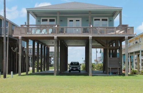 San Luis House | Relax and enjoy water views of the Gulf and beautiful home so near the beach!