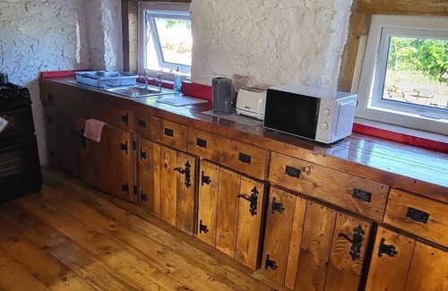 Ballintober House | Relax and unwind with hot tub and open fire