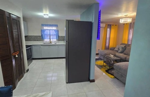 Portmore Villa | Relax by the pool with the sounds of waves and enjoy ocean and mountains views