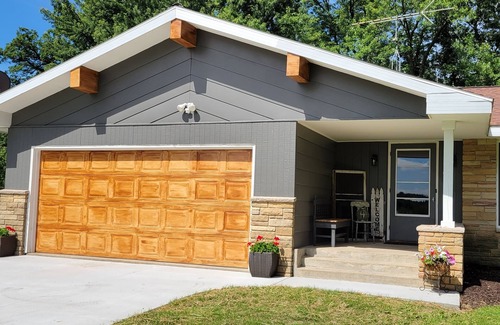 Babcock House | Relax by the river in this 4 bedroom house with firepit- spot our river eagle!