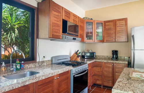 Puerto Morelos House | Relax by the sparkling pool and enjoy the ocean breeze.