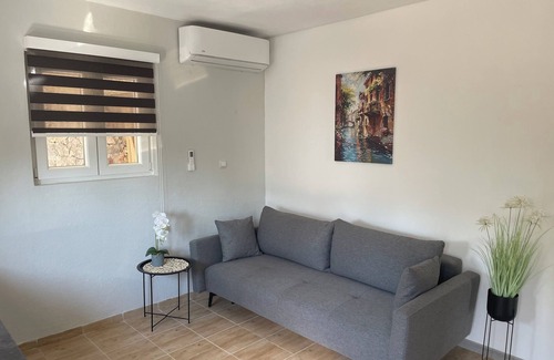 Lustica Apartment | Relax far away from it all and wake up to sea views and Montenegrin charm
