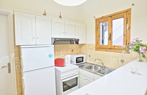 Kalami Apartment | Relax in Comfort by the Sea: Zoulis Sofia Corfu Apartment