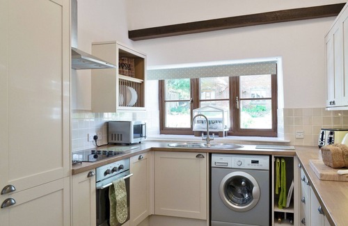 Munslow Cottage | Relax in front of the woodburner in this single-storey barn conversion.
