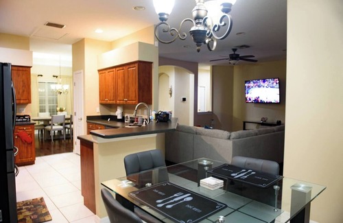 Lakeland House | Relax in Heated Saltwater Pool w/Screened Lanai
