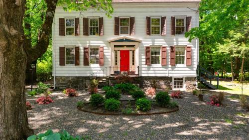 Town of Marbletown House | Relax in Style at Historic Modern on Main with Modern Amenities Wooded Views
