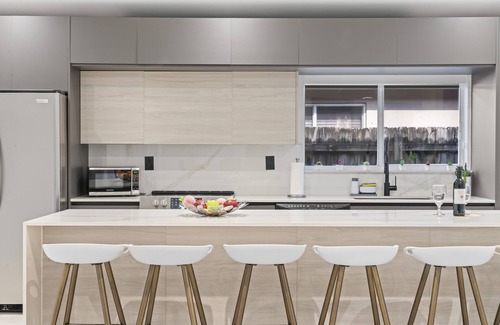 Richmond West House | Relax in Style: Pool, Golf, Luxe Kitchen, Sleeps 12