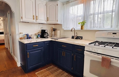 Southeast Yonkers Apartment | Relax in Style~Spacious 2BR w/Porch + Firepit~ Sleeps 7 ~ Free Wifi and Parking