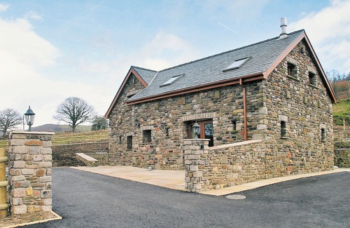 Neath Cottage | Relax in the shared indoor heated swimming pool, hot tub or sauna.