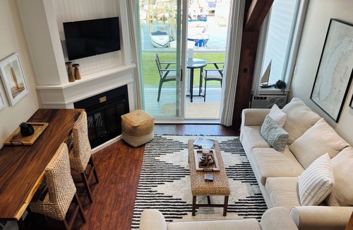 Charlevoix Condo | Relax in this beautiful condo on Lake Charlevoix!