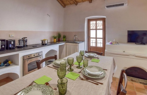 Oliena Apartment | Relax in your cozy apartment in the heart of historic Oliena.