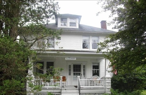 Eagles Mere Cottage | Relax on the covered front porch at "Allegheny" in Eagles Mere