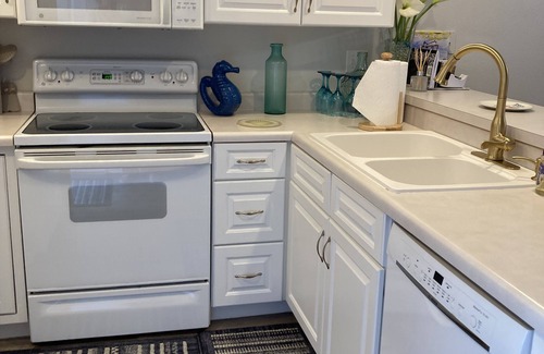 Camdenton Condo | Relax on your screened in balcony overlooking the Lake. Two Golf Courses nearby.