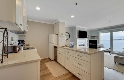 Boyne City Condo | Relax & Unwind | Lake Charlevoix Views | Private Patio + Beach | Fireplace |