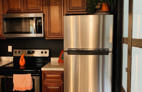 Gray House | Relax with the whole family at this peaceful place. Nestled in the woods of KY.