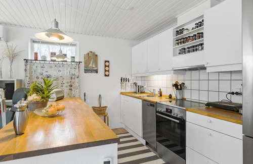 Follenslev House | Relax with your family in this bright and beautiful vacation home with a private garden.