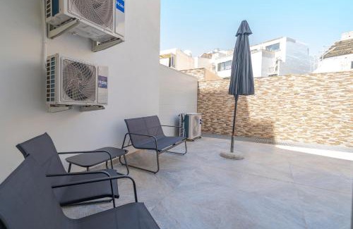 Tarxien Apartment | Relaxed 2BR Home with Backyard & Balconies,Tarxien
