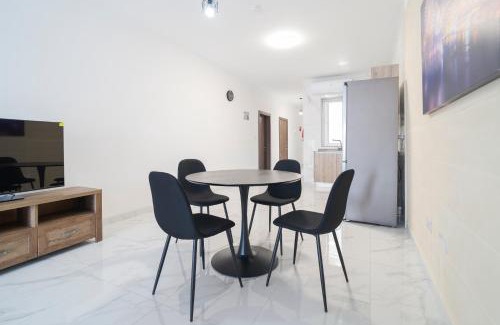 Tarxien Apartment | Relaxed 2BR Home with Backyard & Balconies,Tarxien