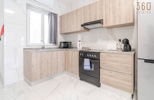 Tarxien Apartment | Relaxed 2BR Home with Backyard & Balconies,Tarxien