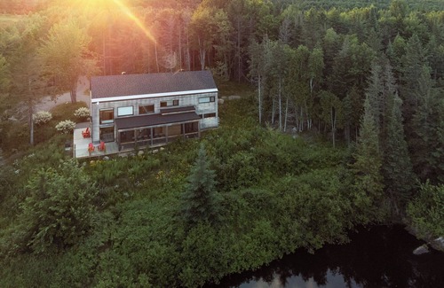 Mauricie House | Relaxing Escape w/Fireplace, BBQ & Serene Du Loup River Backdrop