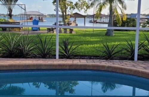 Sylvan Shores House | Relaxing Getaway on Peaceful Lake Clay- Pool, Patio, Lake