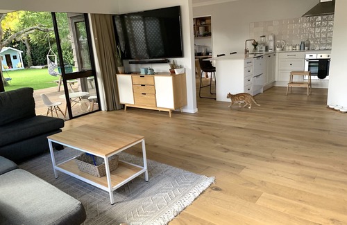 Papamoa Beach House | Relaxing Haven For Families With Spa - minutes walk to the beach, shops & dining