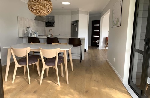 Papamoa Beach House | Relaxing Haven For Families With Spa - minutes walk to the beach, shops & dining