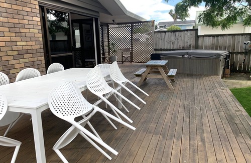 Papamoa Beach House | Relaxing Haven For Families With Spa - minutes walk to the beach, shops & dining