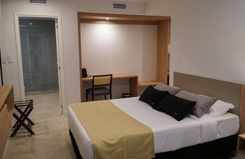 Rio Cuarto Hotel | Relaxing Room With Pool Free Breakfast And Parking Near Local Attractions