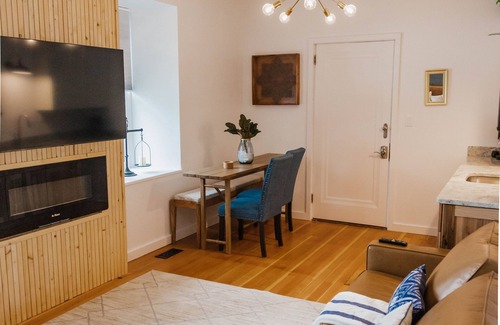 Elkader Villa | Relaxing Suite C “The Sweetest Suite on the River” on Historic Main Street.