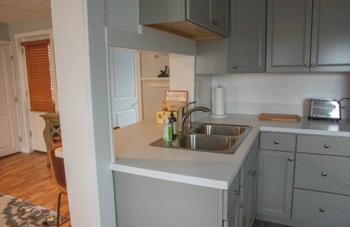 Charlevoix House | Remodeled 2-bedroom first floor unit in the heart of Downtown Charlevoix.